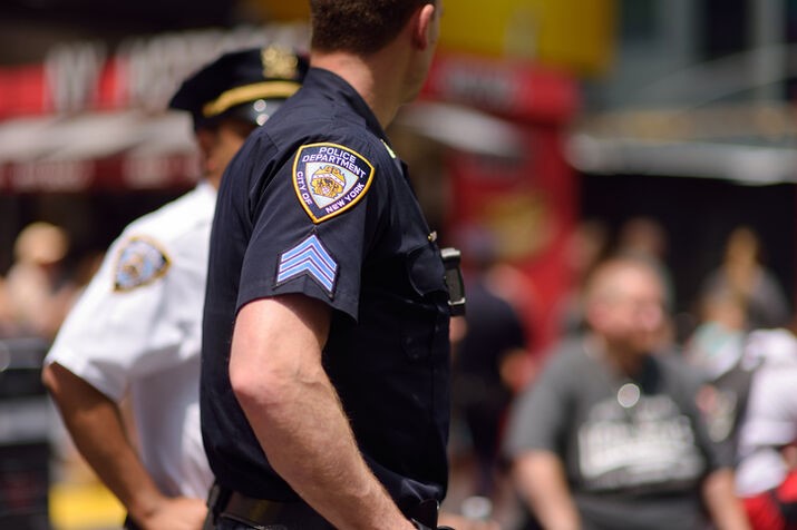 A close-up of a police officer

AI-generated content may be incorrect.